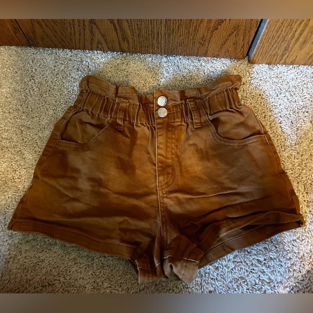 Orangish brown jean shorts size small.